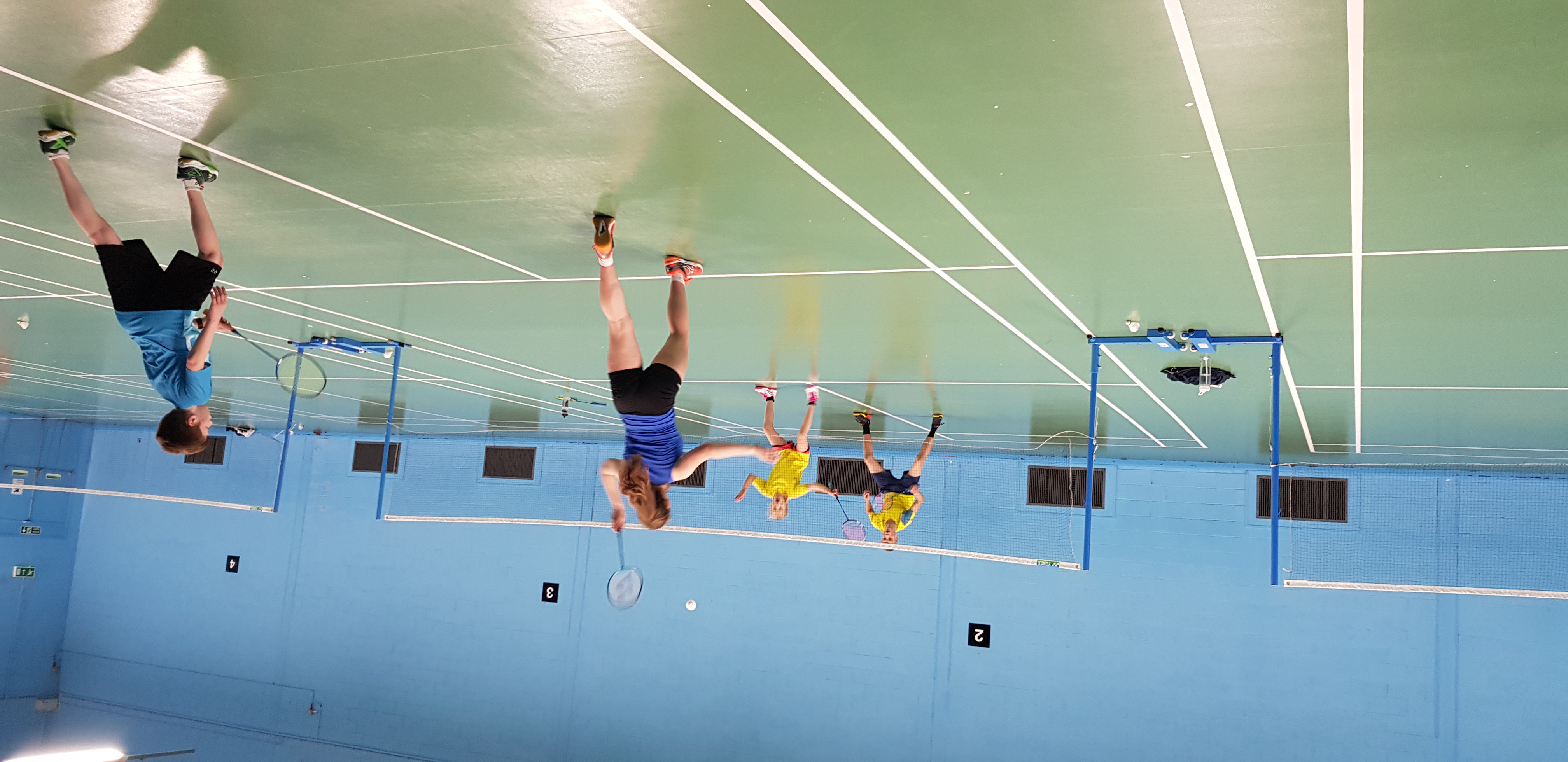Four players practising doubles at Leicestershire Performance Centre